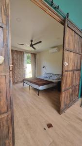 En eller flere senge i et værelse på Baan kratay