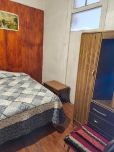 En eller flere senge i et værelse på CASA Donde LOUISA SANCHEZ