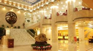 Lobbyen eller receptionen på Zhangjiagang Guomao Hotel + 242 billeder