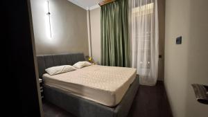 Postel nebo postele na pokoji v ubytování Snow Plaza Apartments 46