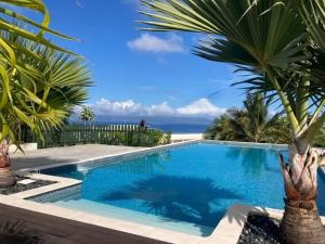 Πισίνα στο ή κοντά στο Brand NEW, breathtaking panoramic view on lagoon and Moorea