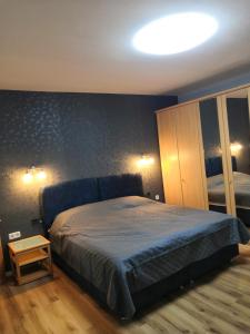 Ένα ή περισσότερα κρεβάτια σε δωμάτιο στο Luxapartament Schwerte Central