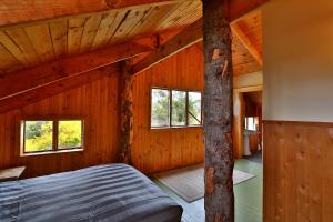 Posteľ alebo postele v izbe v ubytovaní Bruny Island Lodge