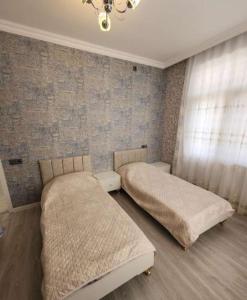 Postel nebo postele na pokoji v ubytování Zizik + 1 fotografie