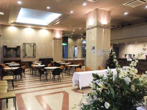 Veitingastaður eða matsölustaður á Oustat Kokusai Hotel Tajimi