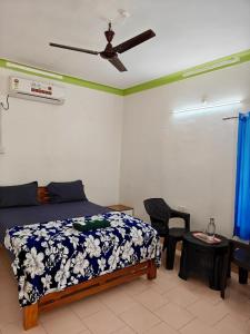 Postel nebo postele na pokoji v ubytování New Paradise Inn + 6 fotografií