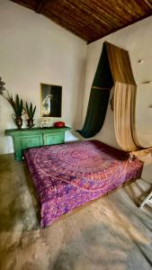 Postel nebo postele na pokoji v ubytování SAVAGE - pousada