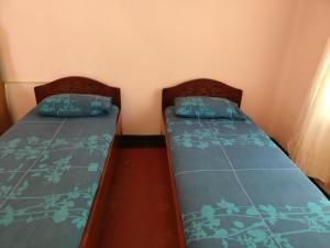 Letto o letti in una camera di Chami's Place