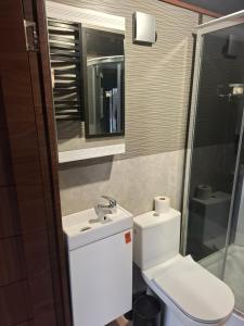 Koupelna v ubytování TORA nameliai