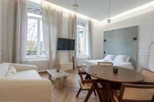 Et tv og/eller underholdning på Maison les Arcades - Collection AURA