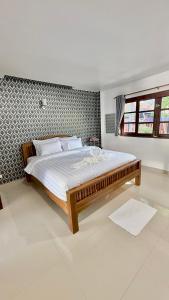 En eller flere senge i et værelse på Baan Fah Sai 2-Bedroom Pool Villa + 43 billeder