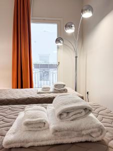 Кровать или кровати в номере Hotel la Scala