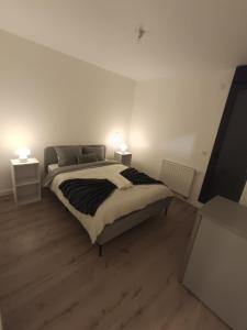 Postel nebo postele na pokoji v ubytování Chambre simple à 20 minutes de Paris