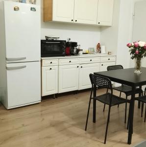 Kuchyň nebo kuchyňský kout v ubytování Chambre simple à 20 minutes de Paris