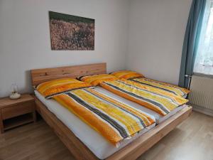 En eller flere senge i et værelse på Apartment Moni in Lutzmannsburg, 1 km von der Sonnentherme entfernt - Apartment mit 3 Schlafzimmern + 29 billeder