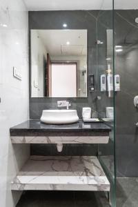 Koupelna v ubytování Soni Arena Hotel