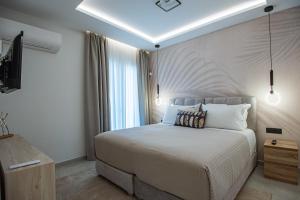 En eller flere senge i et værelse på Ozen Luxury Villa and Suite + 39 billeder