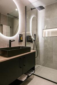 Et badeværelse på Ozen Luxury Villa and Suite