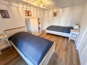 Postel nebo postele na pokoji v ubytování Apartment im Winkel