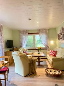 Et tv og/eller underholdning på Ferienhäuser Pannier III und IV Doppelhaushälften