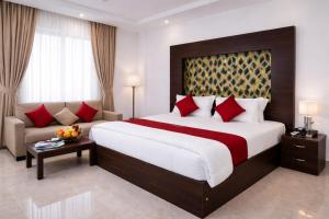 En eller flere senge i et værelse på Darwar Palace By Av Hotel + 41 billeder