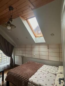 Ένα ή περισσότερα κρεβάτια σε δωμάτιο στο Guest house Alyaska +20 φωτογραφίες