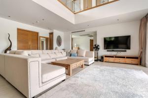 TV/trung tâm giải trí tại WEG Laguna Residence