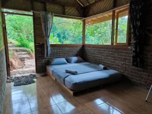 Postel nebo postele na pokoji v ubytování Farmstay Manangel + 36 fotografií