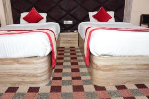 Postel nebo postele na pokoji v ubytování Hotel Opera