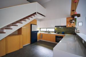 Køkken eller tekøkken på Converted Chapel Villa with Pool & Arcade in Dumaguete