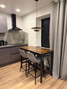 Kuchyň nebo kuchyňský kout v ubytování App