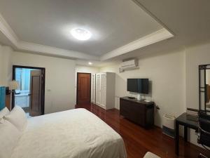 TV a/nebo společenská místnost v ubytování 靜園民宿 ChillandBNB + 8 fotografií