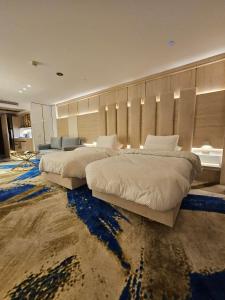 Postel nebo postele na pokoji v ubytování Sheraton Air Hotel