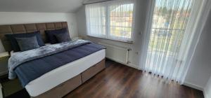 En eller flere senge i et værelse på Villa Naomi Bjelovar + 26 billeder