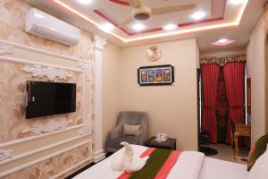 Μια τηλεόραση ή/και κέντρο ψυχαγωγίας στο Gold Max Hotel