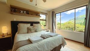 Postel nebo postele na pokoji v ubytování Titanic View - Place of Peace + 68 fotografií