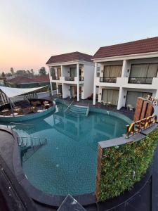 Swimmingpoolen hos eller tæt på Olive Green Resorts and Villa