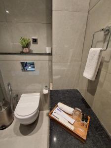 Et badeværelse på Olive Green Resorts and Villa