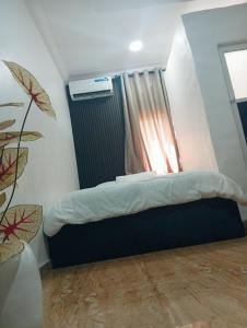 Postel nebo postele na pokoji v ubytování Heirloom Luxury Hotel and Apartments