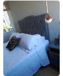 En eller flere senge i et værelse på Casa Por do Sol + 5 billeder