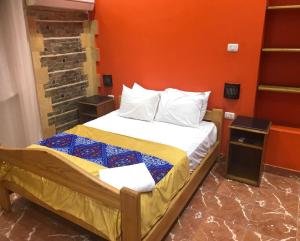 En eller flere senge i et værelse på New Golden Cairo Down Town