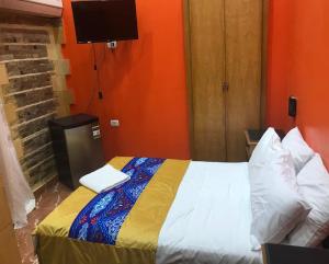 En eller flere senge i et værelse på New Golden Cairo Down Town