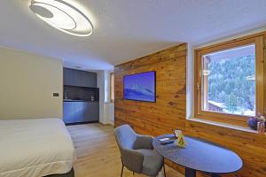 En eller flere senge i et værelse på Una finestra sulle terme