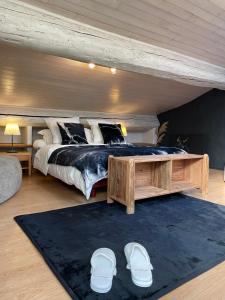 Postel nebo postele na pokoji v ubytování Au Remp'Arts