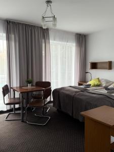 Postel nebo postele na pokoji v ubytování Dom Wczasowy Barbara