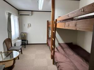 En eller flere senge i et værelse på 白馬の森 チロルハット