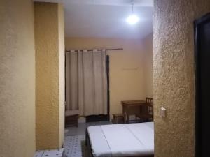 Giường trong phòng chung tại Viva Lodge