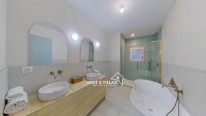 Et badeværelse på Host Villas CASA SOLEADA Tosse