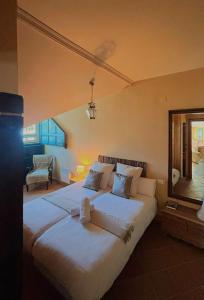 En eller flere senge i et værelse på Plaza Andalucía Edificio Enebro 4-6 pax