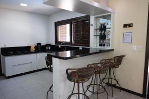 Køkken eller tekøkken på Casa nos Ingleses com piscina e jacuzzi